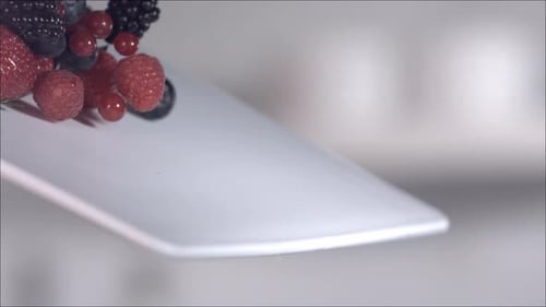 Fresh Mixed Berries Falling in Slow Motion