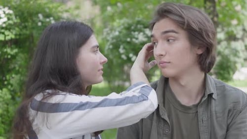 Young Adults Talking and Connecting in an Urban Park
