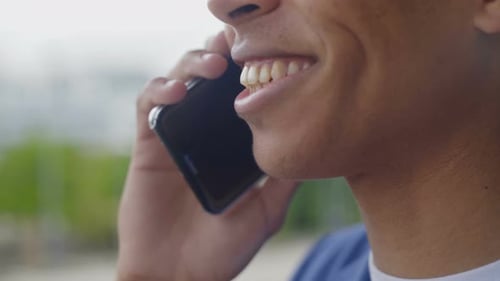 Young Adult Talking on a Cell Phone
