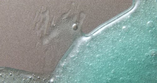 Close Up of Blue Green Bubbly Liquid