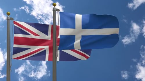 Union Jack and Scotland Flag Waving in Blue Sky