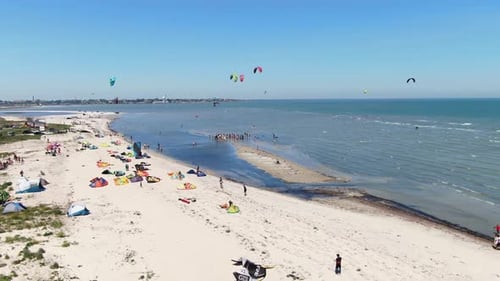 Massive Group of People Near the Shore of the Sea Watching the Kitesurfers,