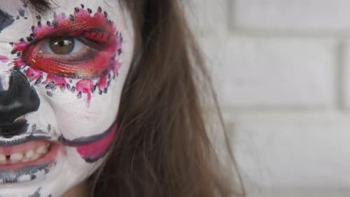 Woman in Day of the Dead Halloween Facepaint