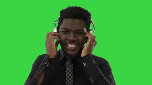 Young Adult Listening to Music on Headphones