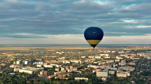 Cityscape View with Floating Hot Air Balloon