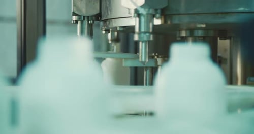 Machines in an automated chemical bottles production line