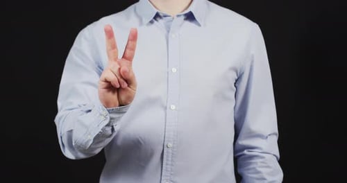 Man showing the V-sign