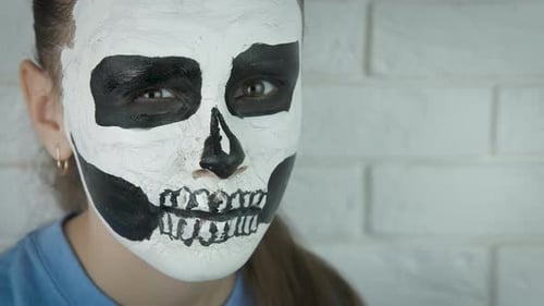 Halloween. The skull on the face