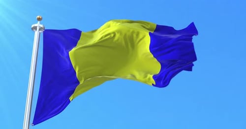 Chad Flag Waving in Wind with Blue Sky Background