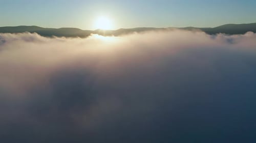 Sunrise Over Clouds in Mountain Landscape