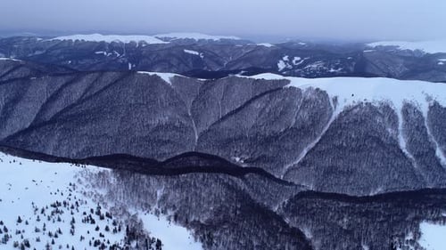 Snowy Mountains and Valleys from Above