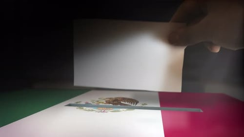 Digital Composite Hand Voting To National Flag OF Mexico