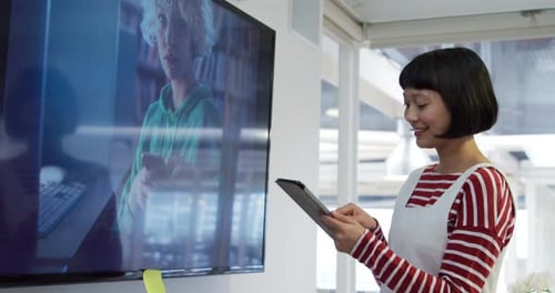 Young woman working in a creative office