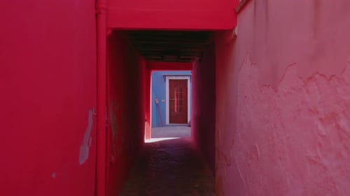 Narrow Lane Between Old Houses in Burano on Sunny Day