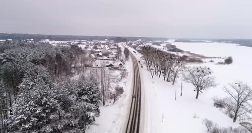 Aerial View of the Snow Road in Winter