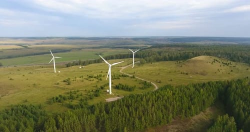 Aerial View of Wind Turbines in Rural Landscape