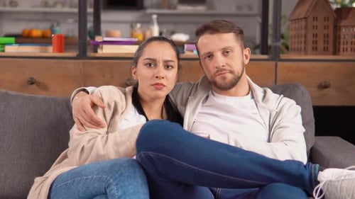 Family Enjoying Interesting Movie Together