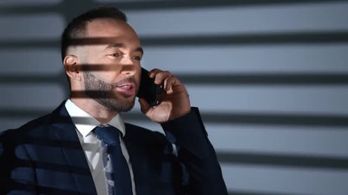 Happy Fashion Business Man Smiling Talking Job Mobile Phone Working at Night Office Jalousie Shadow