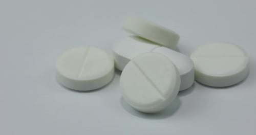 Close Up of Round White Pills