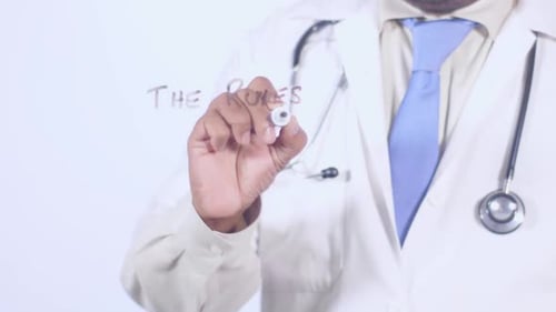 Doctor Writing 'The Rules' on Clear Surface