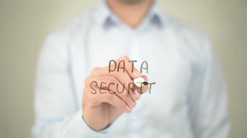 Hand Writes Data Security Concept on Screen