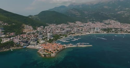 aerial view of old town budva with church and adriatic sea