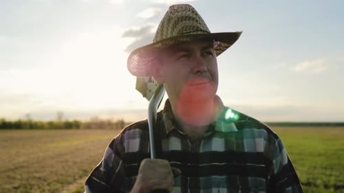 Farmer Holding Shovel in Rural Setting