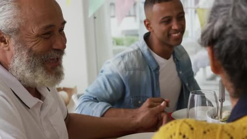 Three Generations Celebrate Friendship at Family Dinner