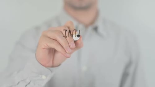 Man Writes Internet Business on Glass Surface