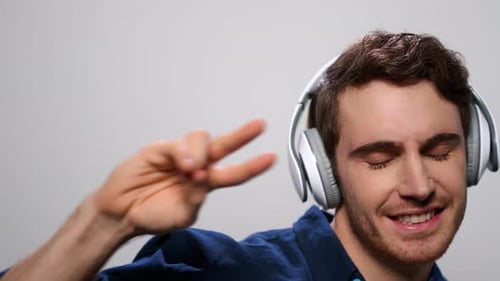 Man Dancing with Headphones, Listening to Music