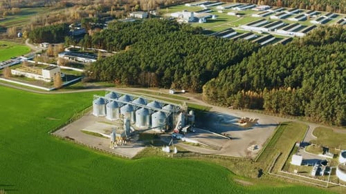 Aerial View Modern Granary Graindrying Complex Commercial Grain Or Seed Silos And Chicken Farm In