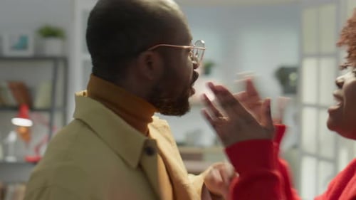 Couple Having a Serious Argument Indoors