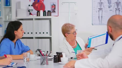 Medical Team Collaborating in Bright Office Setting