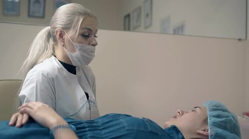 Beautician with Client in Cosmetic Clinic