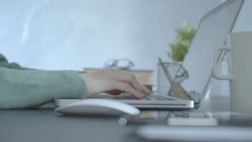 Typing On Laptop