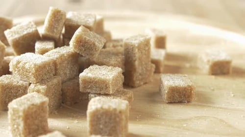 Close Up of Brown Sugar Cube on Table