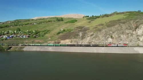 Movimento paralelo ao trem de carga