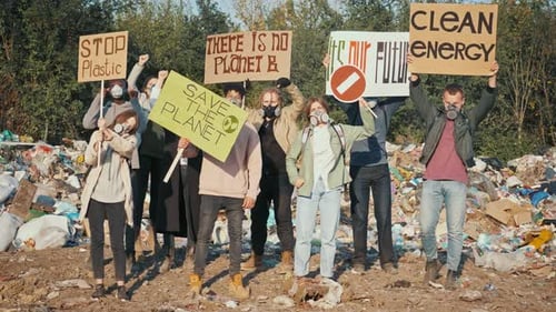 Environmental Activists Protesting in a Polluted Landfill