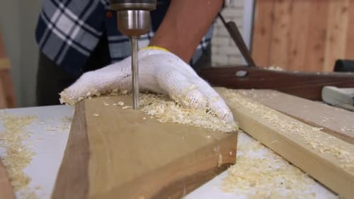 Carpenter Working on Wood Craft at Workshop
