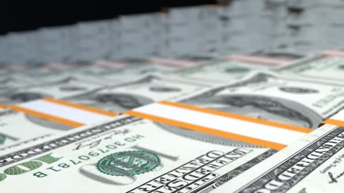 Many wads of money. 100 US dollar banknotes. Stacks of money.