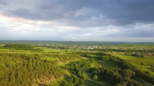 Aerial View of Green Rural Countryside and Village