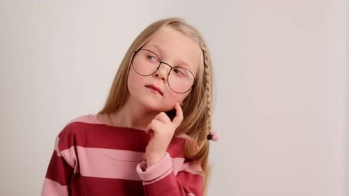 Blonde Girl with Glasses Pondering