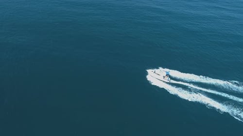 Sea Background, Trail on Sea Water Surface Behind Boat, Speeding White Boat in Calm Sea Water