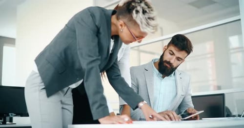 Portrait of Architects Having Discussion in Office
