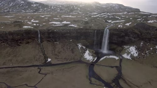 Seljalandsfoss waterfall in Iceland aerial panoramic view at sunrise