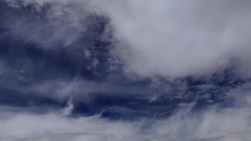 Epic passing cloudscape time lapse in the blue sky, fast time lapse shot