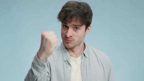Young Adult Man Pointing Directly At Camera
