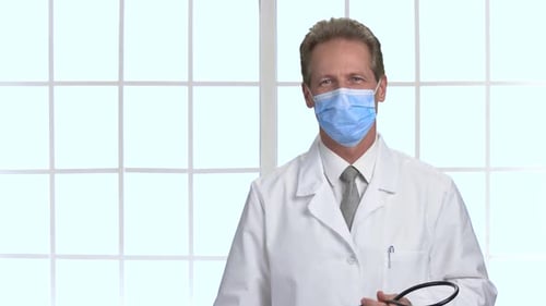 Doctor Wearing Face Mask and White Coat