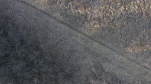 Above the road by early morning 4K drone video
