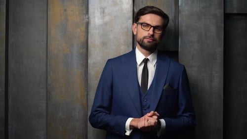 Man in Business Suit Posing Confidently